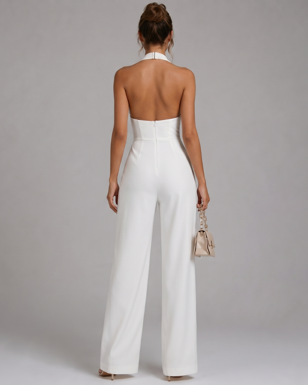 NYMERA | Mono con cuello halter y pernera ancha